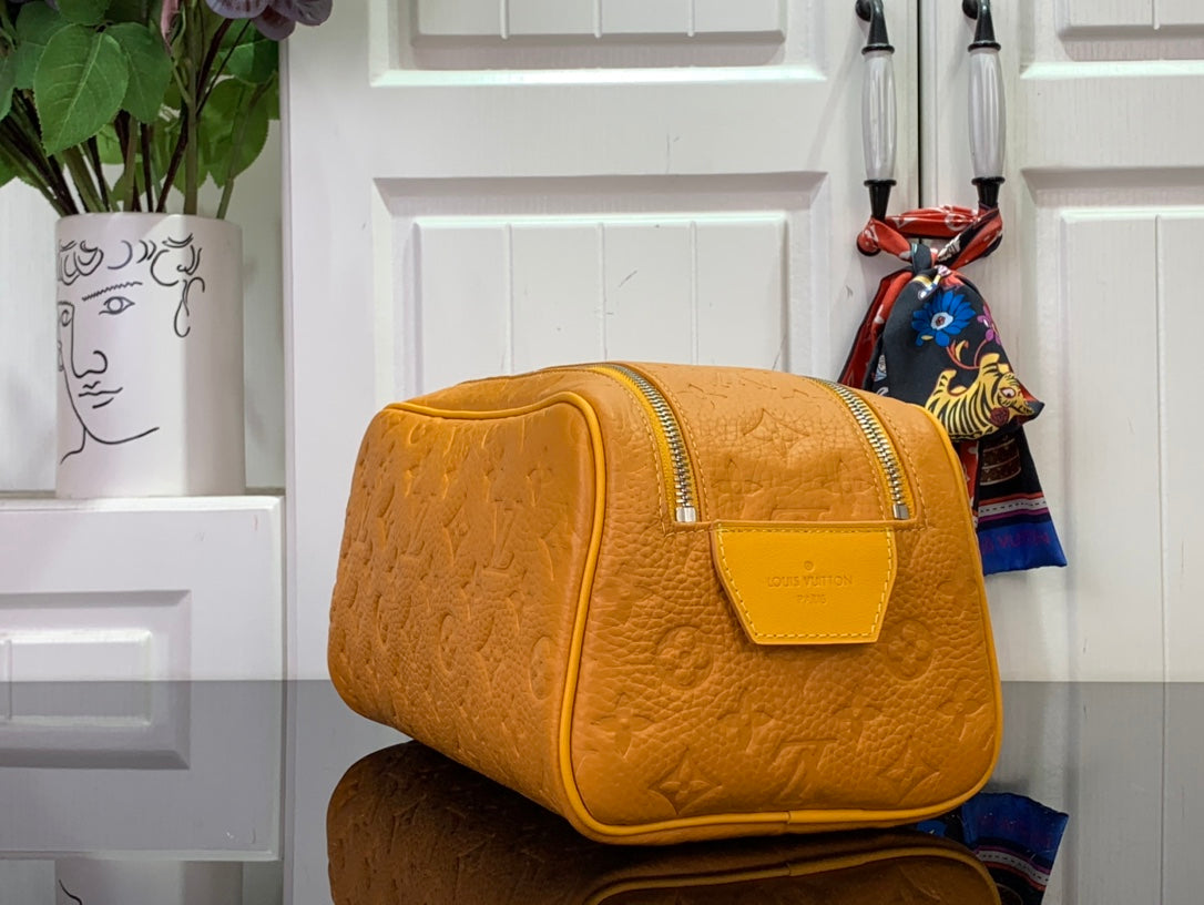 LV Dopp Kit Taurillon Monogram