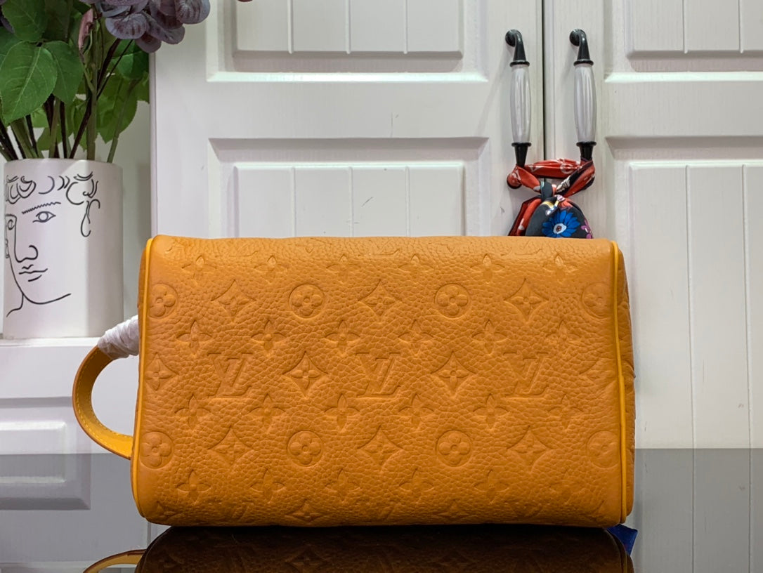 LV Dopp Kit Taurillon Monogram