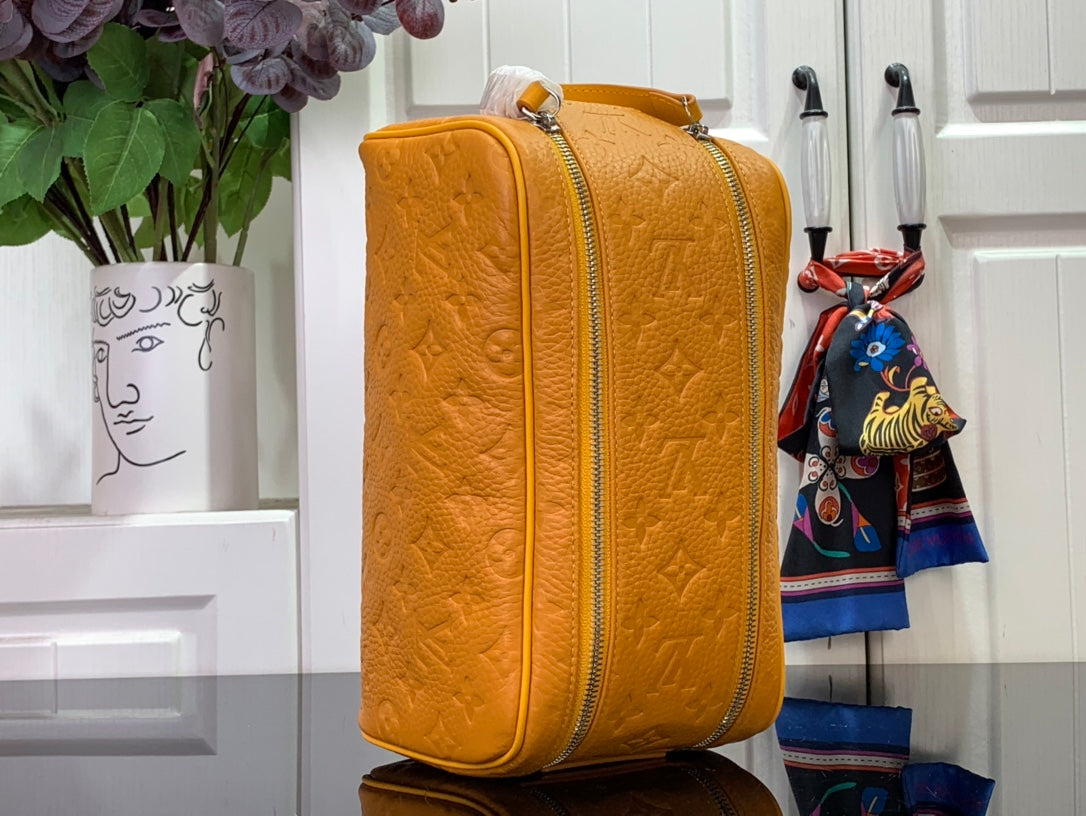 LV Dopp Kit Taurillon Monogram
